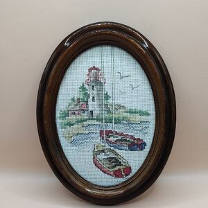 Vintage Framed Nautical Cross-Stitch Art Features A Lighthouse, Birds And Boats